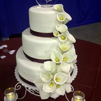 Cascading Callas Gumpaste calla lilies. Anniversary cake on the side