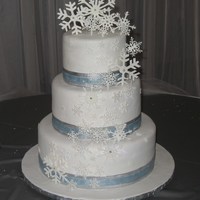 Snowflake Dream WASC with cookies n' cream fillling. Gumpaste snowflakes
