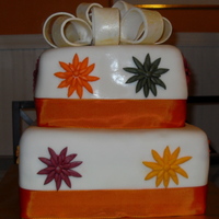 Fall Cake Everything was made out of fondant and instead of making the bow gold i applied shimmer gold, thanks for looking everyone!