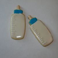 Baby Bottle Cookies This was my 1st time making and decorating sugar cookies. I used the toba glaze recipe. It's a lot of work when you're using...