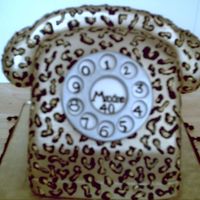 Leopard Print Telephone a carved fondant covered cake with hand painted leopard print