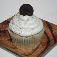 Oreo Cupcake Cupcake is from Cupcake Doctor Recipe and Buttercream dream with oreo crumbs. :)