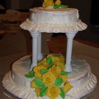 2 Tiered Cake This cake started off bad (cake cracking) and then frosting kept pulling away from the cake. However I love my roses! I think I did a great...