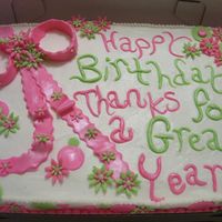 Birthday/end Of School Year Confetti cake with b/c frosting and gumpaste flowers. The writing is fondant and so are the dots.