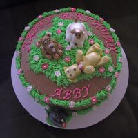 Abby's Birthday Puppies Chocolate & white marble cake with chocolate bc. The puppies are gumpaste or fondant...tfl