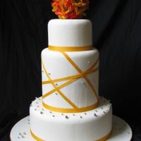 Spring Wedding Fake cake covered with MMF and decorated with silk flowers, ribbon & dragees.