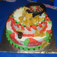 Salsa Themed Cake ( La Cucaracha) Bc with candy mix salsa and Gumpaste chips, gumpaste roach.