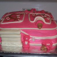 Diaper Bag Cake Cherry Blossoms. BC with MMF and Gumpaste accents. How could I Imporove it?