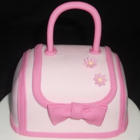 Pink Purse Cake! Carved from a 4" round then turned on its side. TFL!