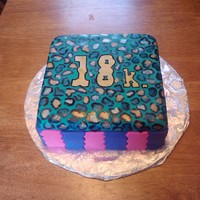 18Th Birthday Fondant and hand painted Cheetah print cake for an 18th Birthday. The girl's name starts with a K, hence the 18k on the top.