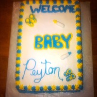 Baby Shower Cake Butter cream icing, first time I did baby booties or bottles out of butter cream.