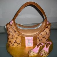 Gucci Purse And Shoes Butter cake covered in fondant..shoes made with shoe template from cc..used gumpaste...TFL