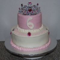 Princess Cake This cake got super simplified from what I had intended. Its a 10 inch lower tier, 6 inch top tier. Iced in BC.