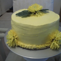 Birthday Cake Yellow pound cake filled with cheesecake filling topped with swiss buttercream. Made for my aunt's birthday. TFL