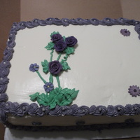 Purple Flowers A simple 2 layer french vanilla cake with pasty cream filling frosted with IMBC. Hope you like it.