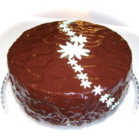 Choc Ganache With Flowers Chocolate cake with Mocha buttercream filling covered in chocolate ganache. Flowers are made from MMF
