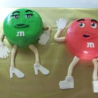 M & M Cakes One was chocolate cake with cookies and cream filling. The other was lemon cake with lemon mousse filling. Both were covered in MMF