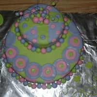 Swirly Circles Made this cake for a friend. Second time using MMF! Very fun cake! Thanks for looking!