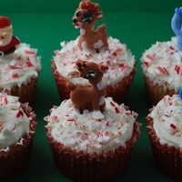 Rudolph And Candy Cane Cupcakes Some fun and basic cupcakes for Christmas featuring the stars of Rudolph the Red Nosed Reindeer and crushed candy cane.