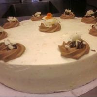 1St_Cake.jpg 1st cake that we were assigned to decorate in class. It is a lemon flavored white cake, orange zested buttercream frosting with chocolate...