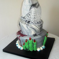 Olmsted Park Conservancy 20Th Anniverscary This is a topsy turvy cake (10", 8", 6") with marbleized fondant. The top cake is a tombstone with sugarveil spiderwebs and...