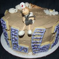 Kellie's Cake My friend had her 40th birthday and we surprised her with this cake. She is a nurse and I added a few of her favorite things. An ice cream...