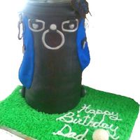 Golf Bag My first BIG cake. Though the picture is deceiving this is a four layer torted cake covered in black chocolate MMF.