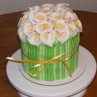 Calla Lillies Birthday cake for my best friend. She loves Calla lillies. Lillies are fondant/gumpaste mix. Didn't have a cutter, so looked up shape...
