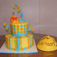 Winnie The Pooh 1St Birthday Cake Winnie the pooh cake done to match the invitation. Buttercream with fondant and gumpaste accents and fondant/gumpaste pooh. Came up with...