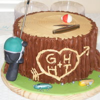 Stump Grooms Cake Chocolate buttercream with fondant accents. Lures made out of fondant and handpainted. Reel made out of rkt covered in fondant (actual pole...