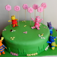 Backyardigans Cake vanilla cake filled with dulce de leche cover in fondant. And the figures are all made in gum paste