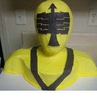 Power_Ranger.jpg Power Ranger with wig head. Buttercream with fondant accents. Thank you to Nicole for her help:)
