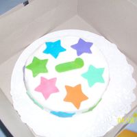 First Birthday This was a smash cake for a boy's first bday. It matched his big cake. All BC with fondant accents.