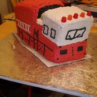 Firetruck I literally did this cake in 2 1/2 hours. It was also for charity. Not as good as my previous firetruck, but not bad for such short time....