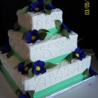 Square Bride fondant flowers were a deep purple, when I take pics of purple it looks blue. If anyone has tips for that I would appreciate them. anyhow,...