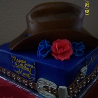 Hat And Belt butter cream icing. fondant flowers, belt and brim