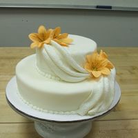 Mothers Day Tiger Lillies This is made with choco-pan. It is a chocolate fondant, taste great and easier to work with then regular fondant; and you can roll it out...