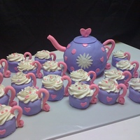 Tea Time! Vanilla cream cheese cake covered in fondant. I used the sports ball pan for the teapot. TFL!!