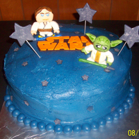 Star Wars Birthday Cake Fondant/gumpaste figures, buttercream frosting, and fondant/gumpaste decorations.