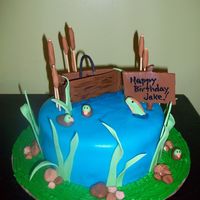Fishing Cake Fishing cake with fondant and gumpaste decoations.