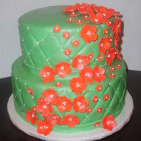 Coral & Green 8 & 10 in round, green quilting with pearls as accents, coral flower with pearls.