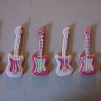 Guitar Cookies Guitar Cookies for Bat Mitzva Cake in my photo gallery. Sugar Cookies covered with MMF and silver luster dust accents.