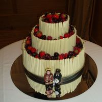 P5300086.jpg 1st ever wedding cake, made it for a friend as her wedding present so she wasn't expecting perfection. Good job too. 6", 10&quot...