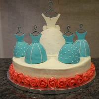 Bride With Her Bridesmaids The bridesmaids wore the same color dresses. The roses matched the bouquets