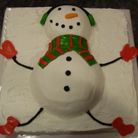 Frosty Vanilla Cake with vanilla buttercream accents done in fondant