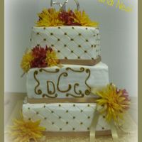 Tiered 50Th Anniversary Cake 3 Tiered 50th Anniversary Cake8" Dummy Cake10" Chocolate Cake with Cookies & Cream Filling and buttercream Icing12"...