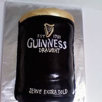 Guinness Cake This is a vanilla cake with strawberries and cream buttercream. The cake is covered in a chocolate fondant. The lettering is cut out of...
