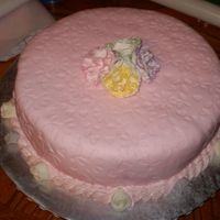 April_09_020.jpg This was my attempt at a strawberry cake with a strawberry buttercream icing covered with fondant. I used my fondant imprint mat for the...