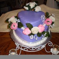 April_09_038.jpg This was for a friend who was renewing her vows with her hubby. She loves purple.