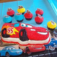 Cars Birthday Cake I made this for my grandson's birthday. It's all buttercream icing and chocolate cake. I also made cupcakes to accent and put...